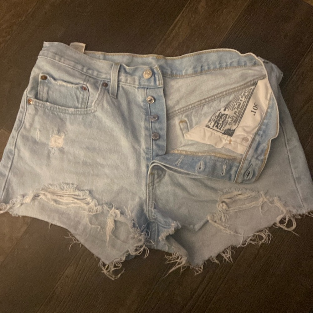 Lite was distressed 501 Levi shorts